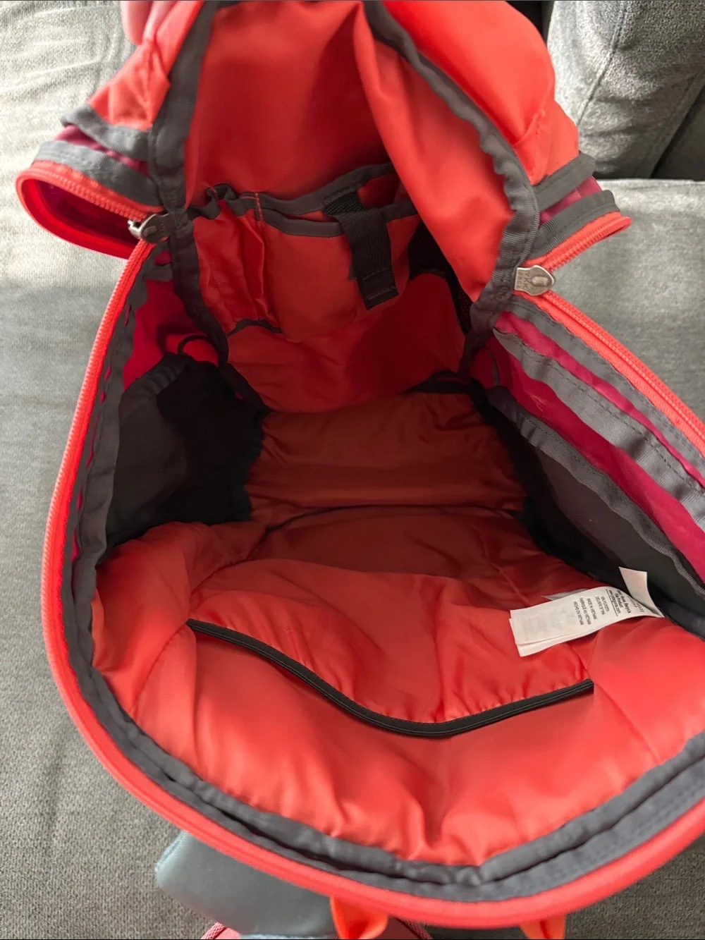 Patagonia Backpack in Bright Pink and Gray with Orange Accents